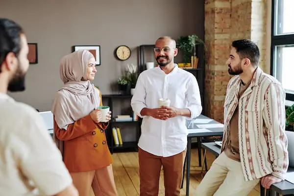 Employees looking at each other in an office