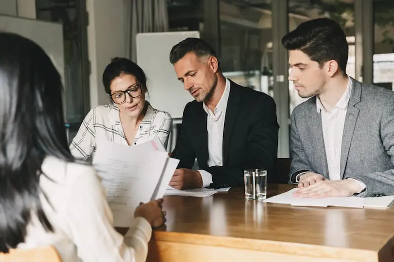 image showing team discussing the emerging trends in facilities Management UK Finance Salary Trends
