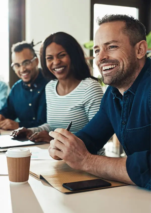 This image depicts a diverse and inclusive workplace, where individuals from different backgrounds are working together.